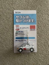 Support mémo argent pour mini voiture SECOM à vendre