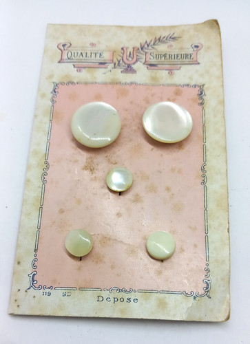 Boutons col en - de,
