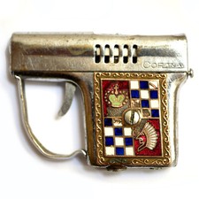 Ancien briquet à essence en forme de pistolet, Marque CORONA