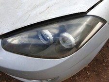 Optique avant principal gauche (feux)(phare) HYUNDAI COUPE 2 PHASE 3 921012C720