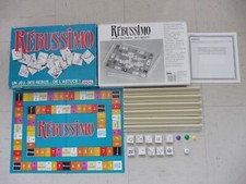 Jeu de société RÉBUSSIMO Un jeu, des rébus... de l'astuce ! Ideal - 1990
