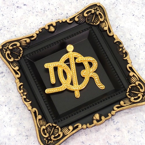 Broche christian dior - broche, métal