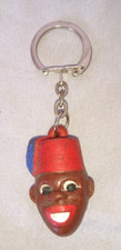 ANCIEN PORTE CLEFS FIGURINE TETE NOIR BANANIA CHOCOLAT 1960 en resine caoutchouc