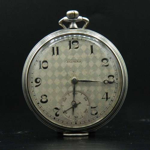Ob273 montre à - -,