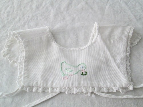 Bavoir ancien pour - , ou