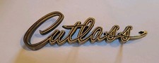 OLDSMOBILE CUTLASS EMBLEM - ORIGINAL - VINTAGE - USA