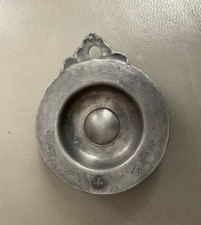 Ancienne palette à saigner en étain objet médical saignée 