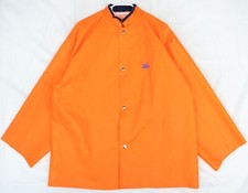 Manteau de pluie orange en PVC