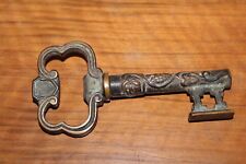 ANCIEN TIRE BOUCHON EN BRONZE