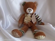 Doudou ours marron, gilet