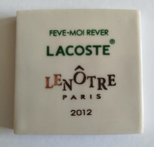 Fève plaque 2012 LACOSTE