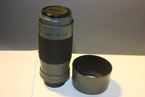 Sigma apo zoom multi - sigma,