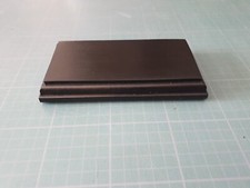 socle en bois noir satiné