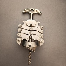 ANCIEN TIRE BOUCHON ZIG ZAG
