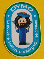 sticker vintage Pinces DYMO Marin, pompon rouge 10,8 x 6,8 cm