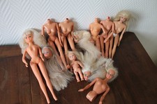 Lot de Barbie + Delavennat  en bon état/et une petite Simba pièces pour Barbie