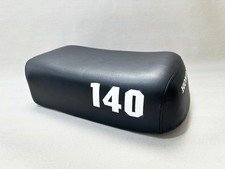 Cache selle moto Honda ATC70