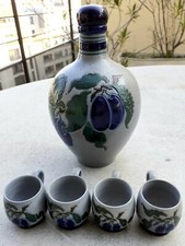 Service à liqueur-1 bros signé et 4 tasses en faïence