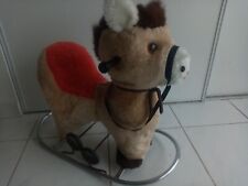 VINTAGE CHEVAL A DOSSIER A BASCULE ET ROULETTES EN FOURRURE DEHOUSSABLE  H 60 CM