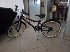 vélo enfant 20 pouces B'TWIN noir et orange excellent état