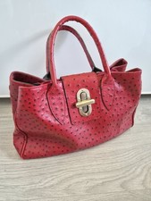 Sac à main rouge en cuir The