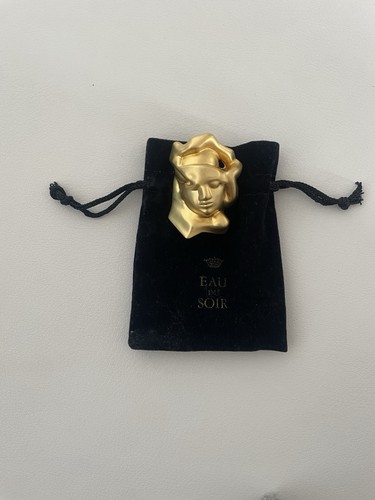 Broche dorée eau - du, soir