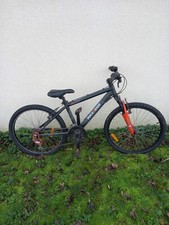 Vélo noir et orange Rockrider 24"