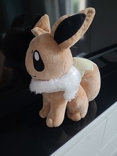 DDE / PELUCHE POKEMON EVOLI 32 cm Env Avec Oreilles/Ne Connais Pas La Marque Tbe