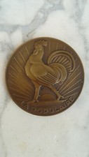 MEDAILLE "LA POPULAIRE" SIGNEE