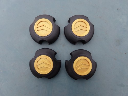 Caches moyeux citroen ax - 4,