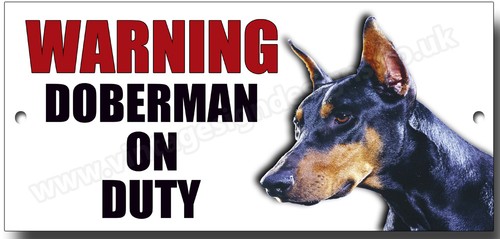 Avertissement doberman sur - avertissement,