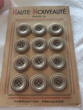 Plaque 12 gros boutons anciens