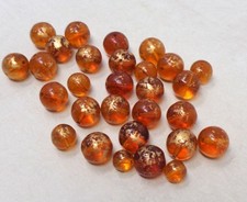 Lot de 29 perles anciennes en