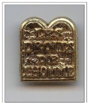 fève métal doré -