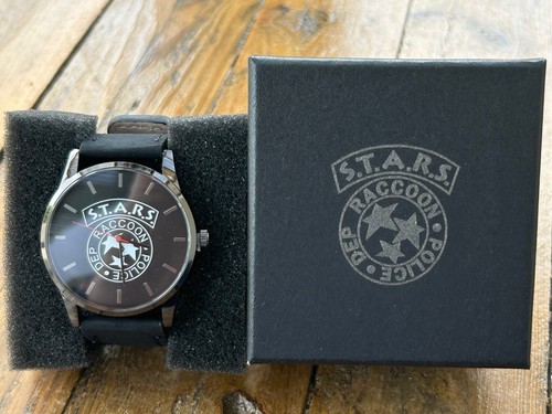 Montre noire marron - noire, ou