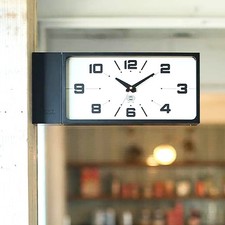 Horloge murale double face