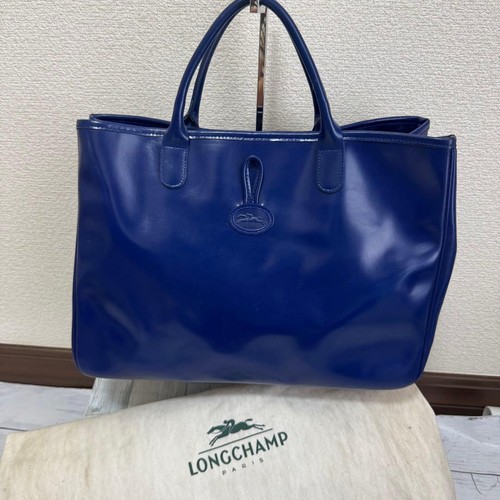 Longchamp business - longchamp,