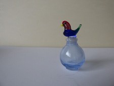 Flacon bouchon oiseau