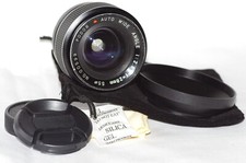 Objectif M42 Grand Angle 28mm f2,8 FODOR avec bouchons, pare-soleil, housse TBE.