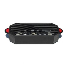 Chauffe plat vintage Staub en fonte émaillée noire à bougies / poignées rouges