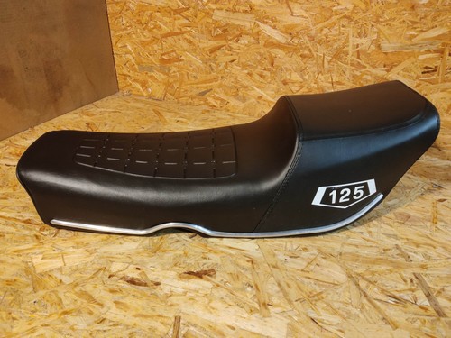 Une selle guiliari - une,