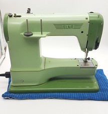 ELNA Ancienne Machine à coudre portable vintage SWISS Tavaro SA Genève 125/130 V