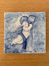 CARREAU DE  CERAMIQUE .Motif ange,peint main.