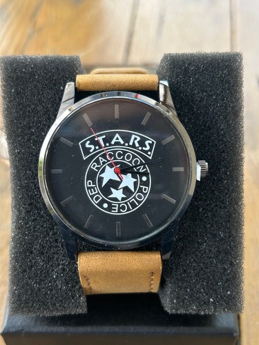 Montre noire marron - montre, ou