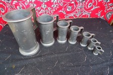 Lot 7 mesures en étain pot a