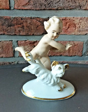 Chérubin et son chien en ancienne porcelaine allemande estampillée