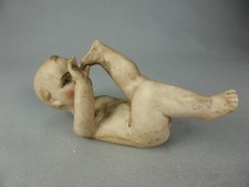 FIGURINE BEBE COUCHE JOUE BISCUIT CERAMIQUE PORCELAINE PIANO BABY 783