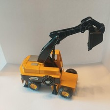 voiture vintage MAJORETTE pelleteuse  réf 4506  ech 1:56 pelle sur pneu