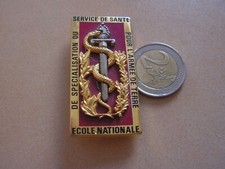insigne  ecole service de sante    ( classeur 12)