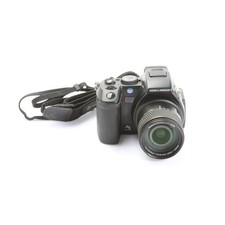 Konica Minolta Dimage A200 +